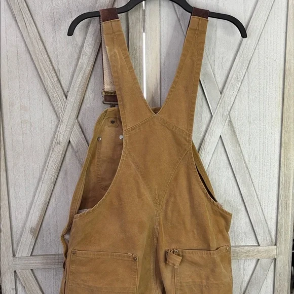 Thrashed vintage 80s or 90s carhartt unlined beige double knee duck overall bibs